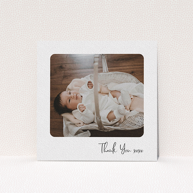 A christening thank you card named "Rounded Thanks". It is a square (148mm x 148mm) card in a square orientation. It is a photographic christening thank you card with room for 1 photo. "Rounded Thanks" is available as a flat card, with mainly white colouring.