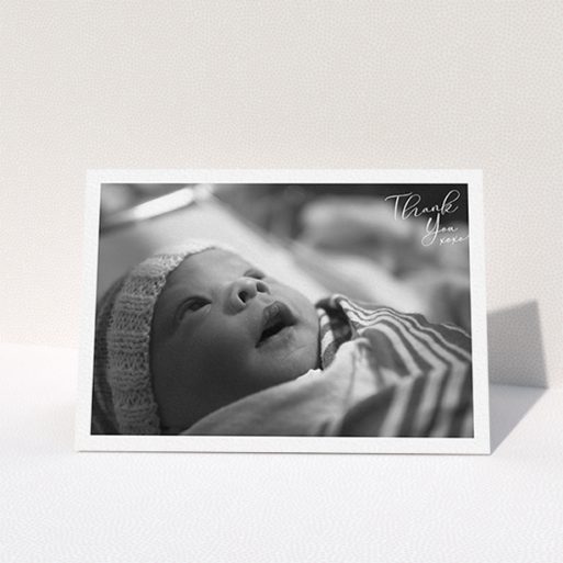 A christening thank you card named "Simple Landscape Thanks". It is an A6 card in a landscape orientation. It is a photographic christening thank you card with room for 1 photo. "Simple Landscape Thanks" is available as a folded card, with mainly white colouring.