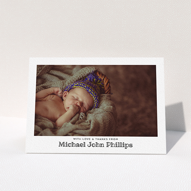 A christening thank you card called "Simple Photo Frame". It is an A6 card in a landscape orientation. It is a photographic christening thank you card with room for 1 photo. "Simple Photo Frame" is available as a folded card, with mainly white colouring.