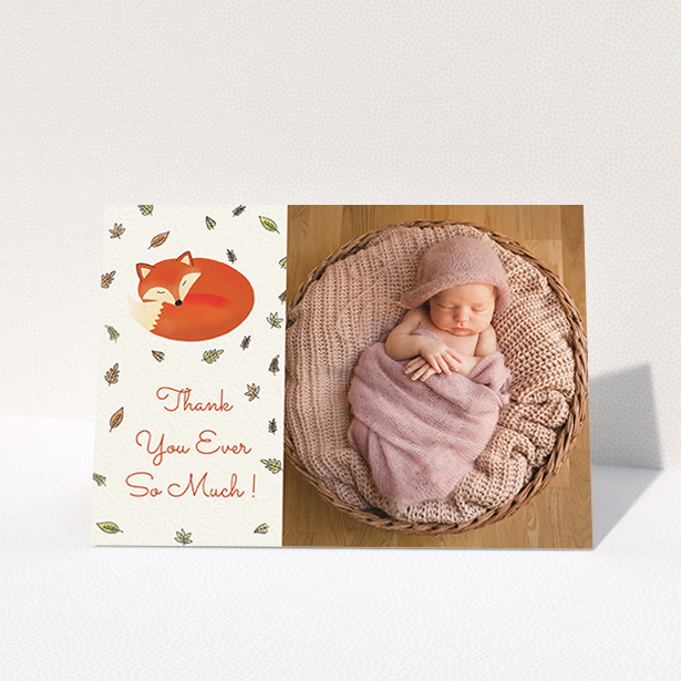 A christening thank you card template titled "Sleepy Fox". It is an A6 card in a landscape orientation. It is a photographic christening thank you card with room for 1 photo. "Sleepy Fox" is available as a folded card, with tones of cream, orange and light yellow.