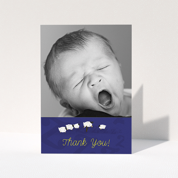 A christening thank you card design called "Sleepy Time". It is an A5 card in a portrait orientation. It is a photographic christening thank you card with room for 1 photo. "Sleepy Time" is available as a folded card, with tones of blue and white.