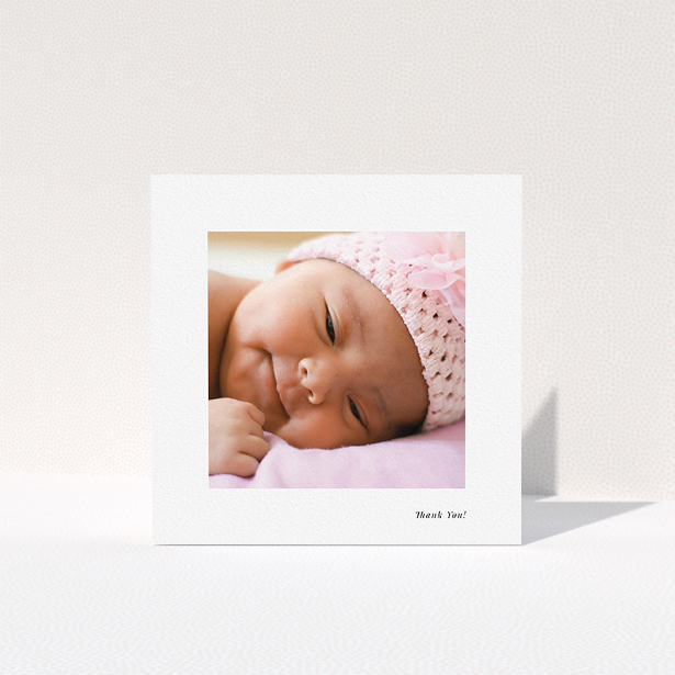 A christening thank you card design named "Thank You!". It is a square (148mm x 148mm) card in a square orientation. It is a photographic christening thank you card with room for 1 photo. "Thank You!" is available as a folded card, with mainly white colouring.