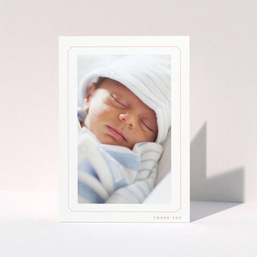 A christening thank you card design called "Thin Pink". It is an A6 card in a portrait orientation. It is a photographic christening thank you card with room for 1 photo. "Thin Pink" is available as a folded card, with tones of white and pink.