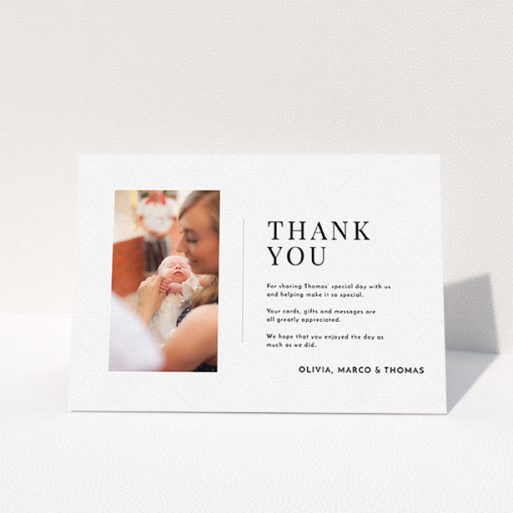 A christening thank you card template titled "Tiny Portrait". It is an A6 card in a landscape orientation. It is a photographic christening thank you card with room for 1 photo. "Tiny Portrait" is available as a folded card, with mainly white colouring.