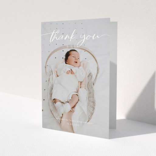A christening thank you card called 'Topped and Bottomed'. It is an A5 card in a portrait orientation. It is a photographic christening thank you card with room for 1 photo. 'Topped and Bottomed' is available as a folded card, with mainly white colouring.