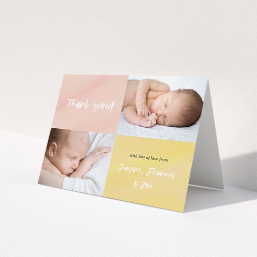 A christening thank you card design called 'Watercolour Corners'. It is an A6 card in a landscape orientation. It is a photographic christening thank you card with room for 2 photos. 'Watercolour Corners' is available as a folded card, with tones of yellow and purple.