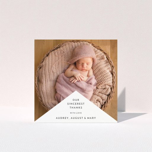 A christening thank you card design called "Wedge Frame". It is a square (148mm x 148mm) card in a square orientation. It is a photographic christening thank you card with room for 1 photo. "Wedge Frame" is available as a folded card, with mainly white colouring.