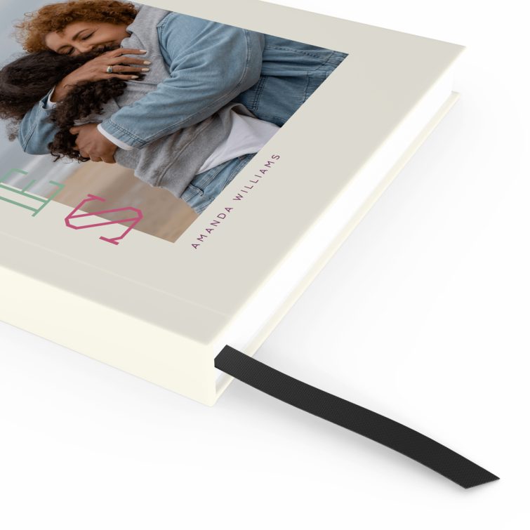 Colourful personalised portrait notebooks with one photo on the cover design by Utterly Printable.