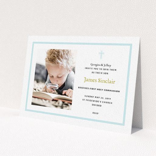 A communion invite card called 'Baby Blue Cross'. It is an A6 invite in a landscape orientation. It is a photographic communion invite card with room for 1 photo. 'Baby Blue Cross' is available as a flat invite, with tones of blue and white.