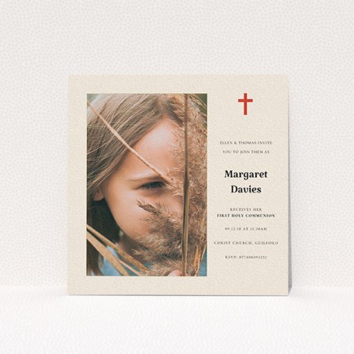 A communion invite card design named "Red Cross". It is a square (148mm x 148mm) invite in a square orientation. It is a photographic communion invite card with room for 1 photo. "Red Cross" is available as a flat invite, with tones of red and cream.