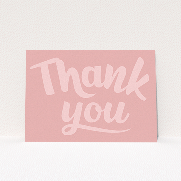 A communion thank you card design called "Big Pink Typography". It is an A6 card in a landscape orientation. "Big Pink Typography" is available as a flat card, with mainly pink colouring.