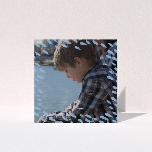 Communion Thank You Card Design - "Blue Daubs" A communion thank you card called "Blue Daubs". It is a square (148mm x 148mm) card in a square orientation. It is a photographic communion thank you card with room for 1 photo. "Blue Daubs" is available as a folded card, with mainly blue colouring.