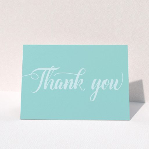 Communion Thank You Card Design - "Blue on Blue Typography" A communion thank you card design named "Blue on Blue Typography". It is an A5 card in a landscape orientation. "Blue on Blue Typography" is available as a folded card, with mainly blue colouring.