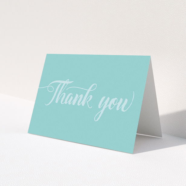 A communion thank you card design named "Blue on Blue Typography". It is an A5 card in a landscape orientation. "Blue on Blue Typography" is available as a folded card, with mainly blue colouring.
