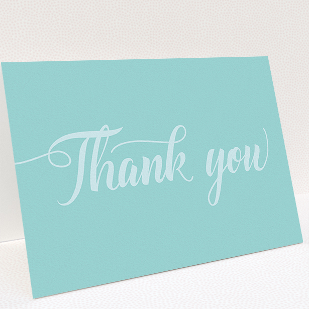 A communion thank you card design named "Blue on Blue Typography". It is an A5 card in a landscape orientation. "Blue on Blue Typography" is available as a folded card, with mainly blue colouring.