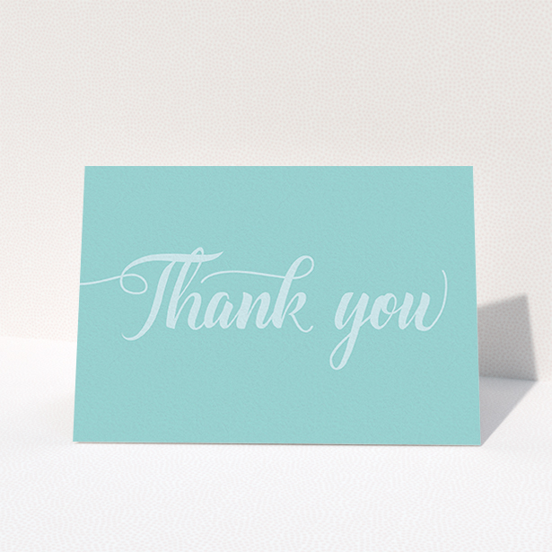 A communion thank you card design called "Blue on Blue Typography". It is an A6 card in a landscape orientation. "Blue on Blue Typography" is available as a folded card, with mainly blue colouring.