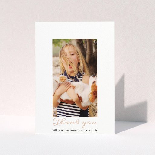 Communion Thank You Card Design - "Central Portrait" A communion thank you card template titled "Central Portrait". It is an A6 card in a portrait orientation. It is a photographic communion thank you card with room for 1 photo. "Central Portrait" is available as a folded card, with tones of white and pink.