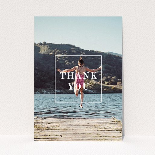 A communion thank you card template titled "Central Thanks". It is an A5 card in a portrait orientation. It is a photographic communion thank you card with room for 1 photo. "Central Thanks" is available as a flat card, with mainly white colouring.