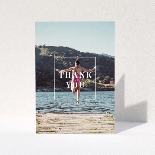 A communion thank you card template titled "Central Thanks". It is an A5 card in a portrait orientation. It is a photographic communion thank you card with room for 1 photo. "Central Thanks" is available as a folded card, with mainly white colouring.