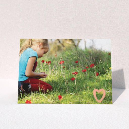 Communion Thank You Card Design - "Hand Drawn Heart" A communion thank you card called "Hand Drawn Heart". It is an A5 card in a landscape orientation. It is a photographic communion thank you card with room for 1 photo. "Hand Drawn Heart" is available as a folded card, with tones of white and pink.