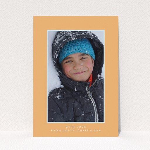 A communion thank you card design titled "Orange and Mint". It is an A5 card in a portrait orientation. It is a photographic communion thank you card with room for 1 photo. "Orange and Mint" is available as a flat card, with tones of orange and blue.