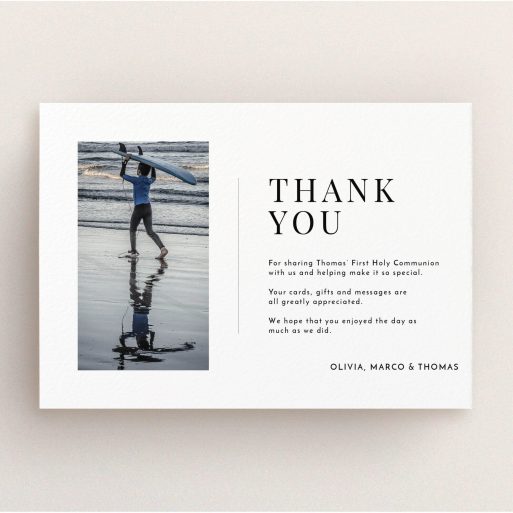 Communion Thank You Card Design - "Tiny Portrait" A communion thank you card named "Tiny Portrait". It is an A5 card in a landscape orientation. It is a photographic communion thank you card with room for 1 photo. "Tiny Portrait" is available as a flat card, with mainly white colouring.