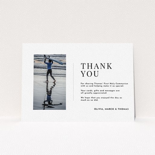A communion thank you card template titled "Tiny Portrait". It is an A6 card in a landscape orientation. It is a photographic communion thank you card with room for 1 photo. "Tiny Portrait" is available as a flat card, with mainly white colouring.