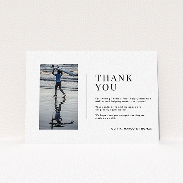 A communion thank you card template titled "Tiny Portrait". It is an A6 card in a landscape orientation. It is a photographic communion thank you card with room for 1 photo. "Tiny Portrait" is available as a flat card, with mainly white colouring.