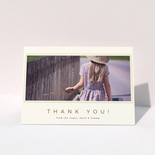 Communion Thank You Card Design - "Torn Cream Frame" A communion thank you card design titled "Torn Cream Frame". It is an A5 card in a landscape orientation. It is a photographic communion thank you card with room for 1 photo. "Torn Cream Frame" is available as a folded card, with mainly cream colouring.