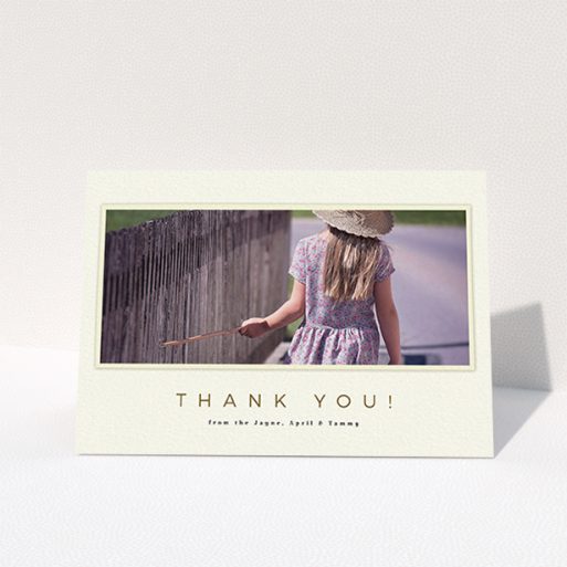 A communion thank you card named "Torn Cream Frame". It is an A6 card in a landscape orientation. It is a photographic communion thank you card with room for 1 photo. "Torn Cream Frame" is available as a folded card, with mainly cream colouring.