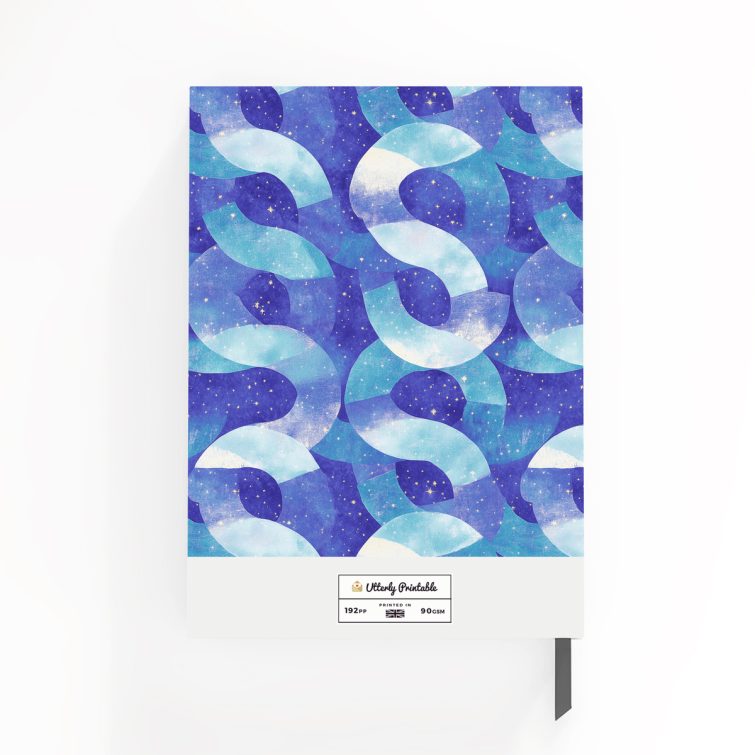 Abstract blue and turquoise pattern notebook design with starry elements on cover spread, no photos present.