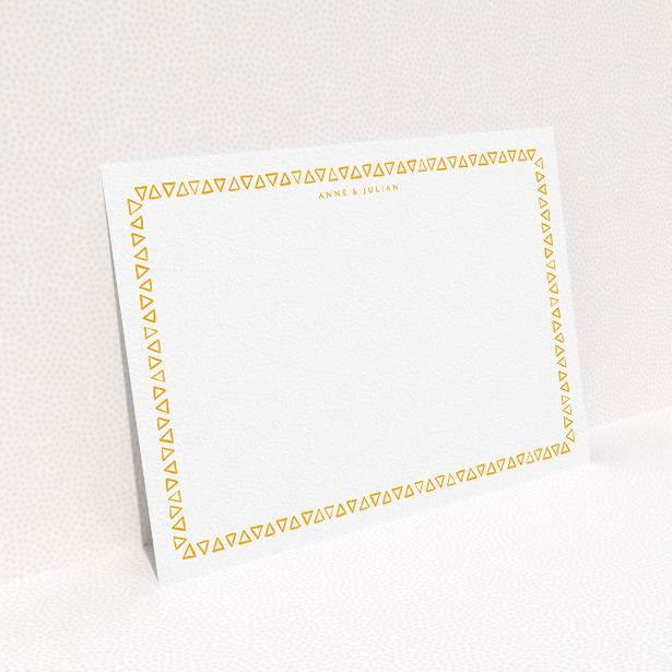 A couples correspondence card template titled "Hand drawn triangles". It is an A5 card in a landscape orientation. "Hand drawn triangles" is available as a flat card, with tones of orange and white.