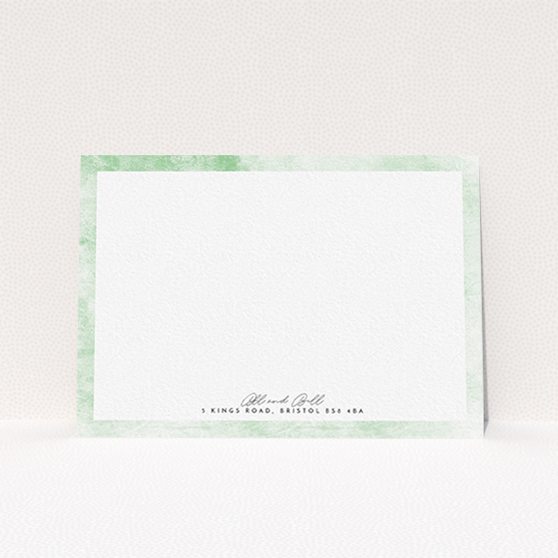 A couples correspondence card design called "Rustic Green". It is an A6 card in a landscape orientation. "Rustic Green" is available as a flat card, with tones of green and white.