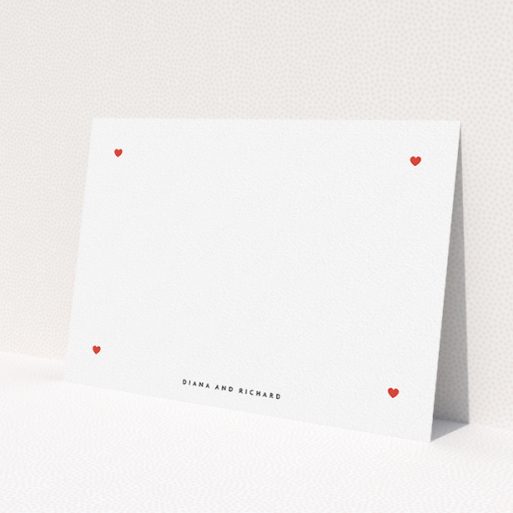 A couples custom writing stationery called 'Four corners of hearts'. It is an A5 card in a landscape orientation. 'Four corners of hearts' is available as a flat card, with tones of white and red.
