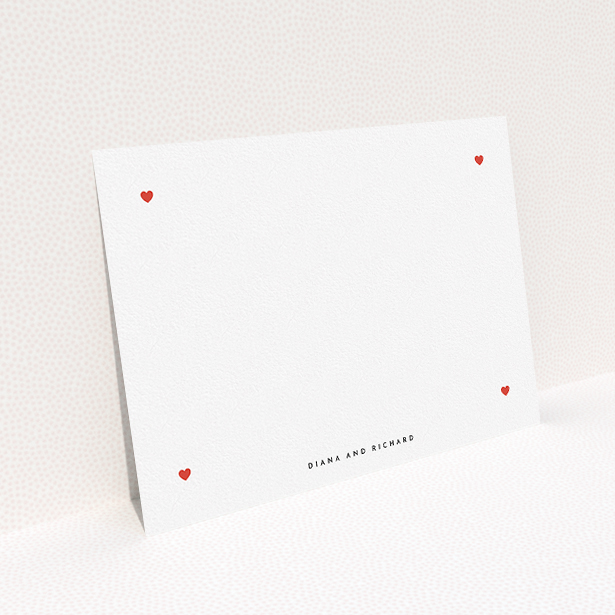 A couples custom writing stationery called "Four corners of hearts". It is an A5 card in a landscape orientation. "Four corners of hearts" is available as a flat card, with tones of white and red.