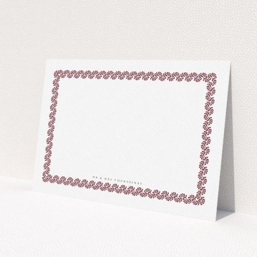 A couples custom writing stationery design titled 'Surrounded by the garden maroon'. It is an A5 card in a landscape orientation. 'Surrounded by the garden maroon' is available as a flat card, with tones of burgundy and white.