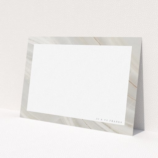 A couples custom writing stationery called 'Swells of marble'. It is an A5 card in a landscape orientation. 'Swells of marble' is available as a flat card, with tones of grey and white.