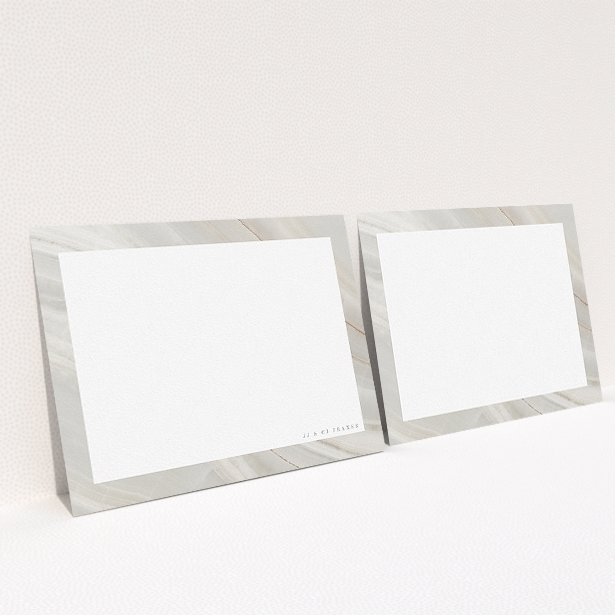 A couples custom writing stationery called "Swells of marble". It is an A5 card in a landscape orientation. "Swells of marble" is available as a flat card, with tones of grey and white.