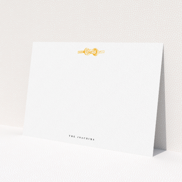 A couples custom writing stationery design called "Tie the knot". It is an A5 card in a landscape orientation. "Tie the knot" is available as a flat card, with tones of white and orange.