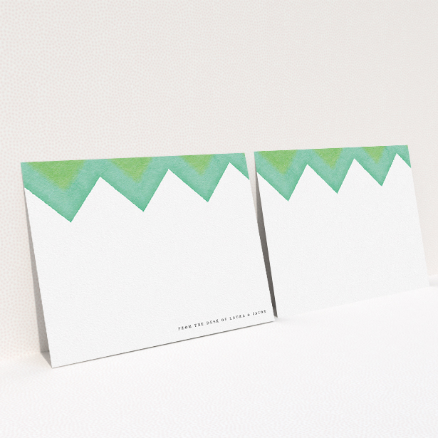 A couples custom writing stationery design named "Vibrant Peaks". It is an A5 card in a landscape orientation. "Vibrant Peaks" is available as a flat card, with tones of green and white.