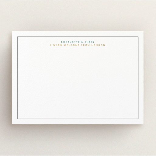 Personalised Note Card Design (Couples) - "A warm welcome from" A couples personalised note card called "A warm welcome from". It is an A5 card in a landscape orientation. "A warm welcome from" is available as a flat card, with tones of white and Orange.