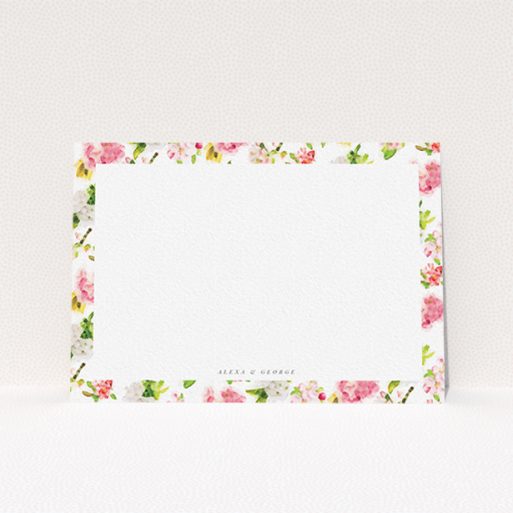 A couples personalised note card design called "Blurred blossom". It is an A6 card in a landscape orientation. "Blurred blossom" is available as a flat card, with tones of pink, green and yellow.
