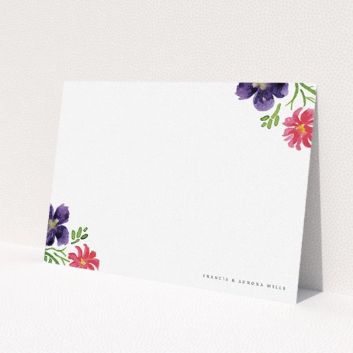 A couples personalised note card template titled 'Flowers encroaching'. It is an A5 card in a landscape orientation. 'Flowers encroaching' is available as a flat card, with mainly purple colouring.