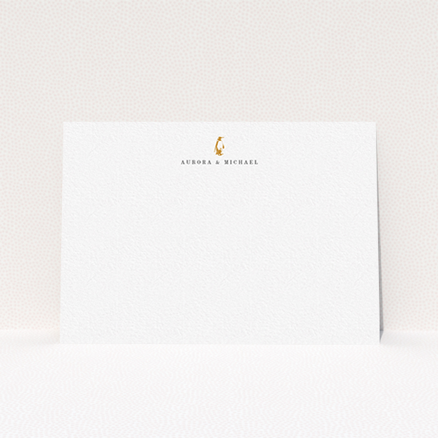 A couples personalised note card named "One little penguin". It is an A6 card in a landscape orientation. "One little penguin" is available as a flat card, with tones of white and Dark orange.