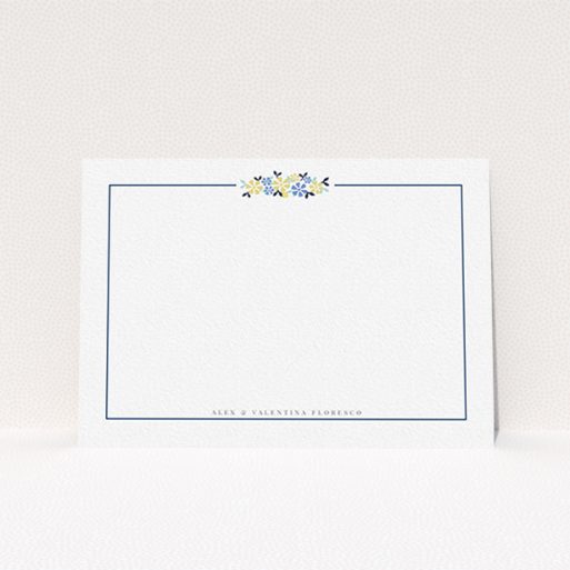 A couples personalised note card design titled "Surrounded by flowers". It is an A6 card in a landscape orientation. "Surrounded by flowers" is available as a flat card, with tones of white and blue.