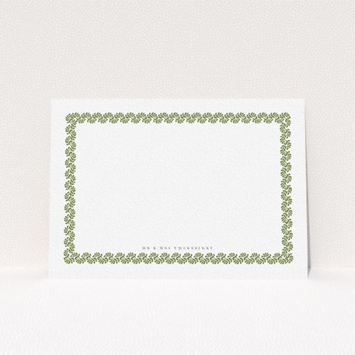 A couples personalised note card design titled "Surrounded by the garden". It is an A6 card in a landscape orientation. "Surrounded by the garden" is available as a flat card, with mainly green colouring.