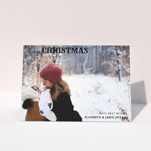 A custom christmas card design titled "Christmas Corners". It is an A5 card in a landscape orientation. It is a photographic custom christmas card with room for 1 photo. "Christmas Corners" is available as a folded card, with mainly black colouring.