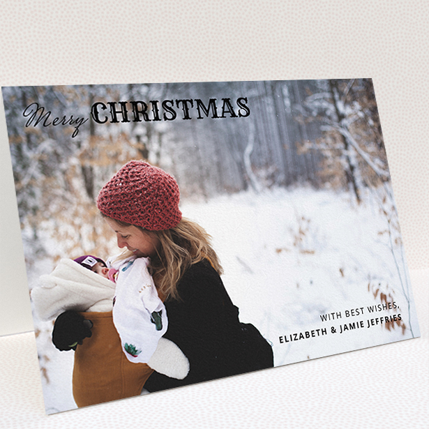 A custom christmas card design titled "Christmas Corners". It is an A5 card in a landscape orientation. It is a photographic custom christmas card with room for 1 photo. "Christmas Corners" is available as a folded card, with mainly black colouring.