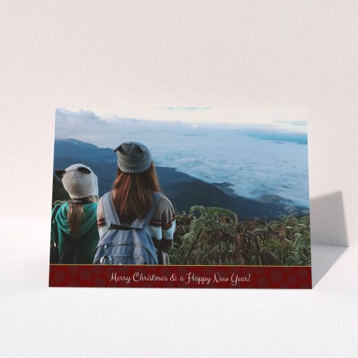 A custom christmas card design named "Dark Red Baubles". It is an A5 card in a landscape orientation. It is a photographic custom christmas card with room for 1 photo. "Dark Red Baubles" is available as a folded card, with tones of burgundy and white.