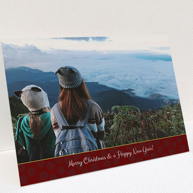 A custom christmas card design named "Dark Red Baubles". It is an A5 card in a landscape orientation. It is a photographic custom christmas card with room for 1 photo. "Dark Red Baubles" is available as a folded card, with tones of burgundy and white.